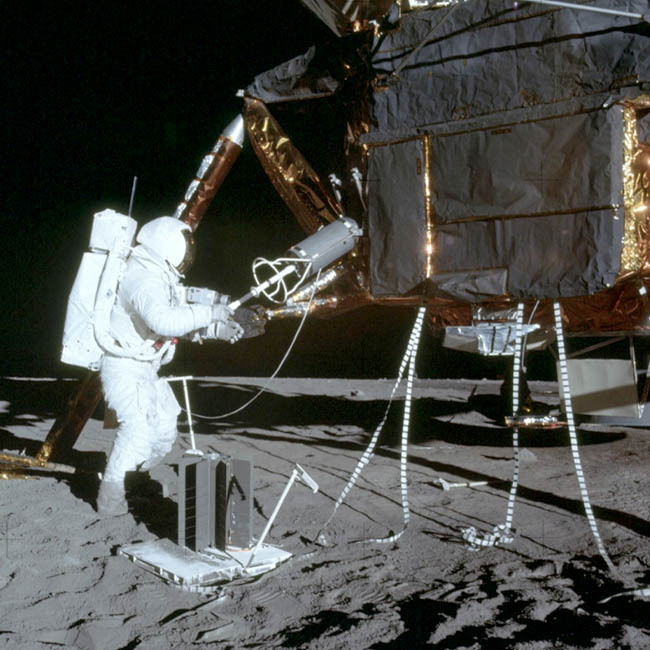 Alan Bean unloads the RGT fuel element container