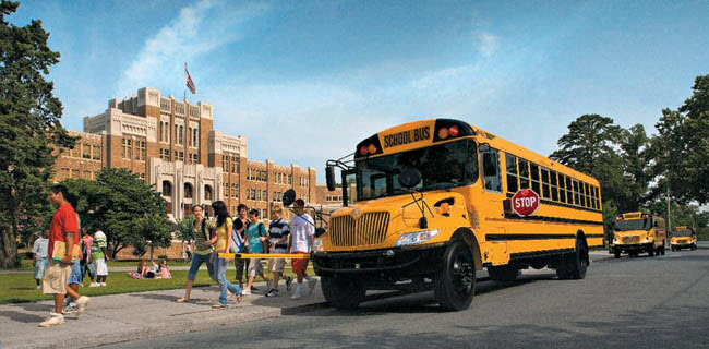 children_getting_off_school_bus
